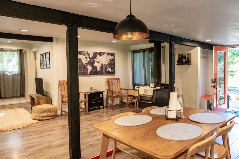 Dining table beneath a world map