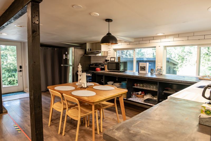 Dining nook with a large world map on the wall